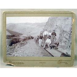 C. 1880'S MOUNTED PHOTO OF MEN ON RAILROAD CARTS -