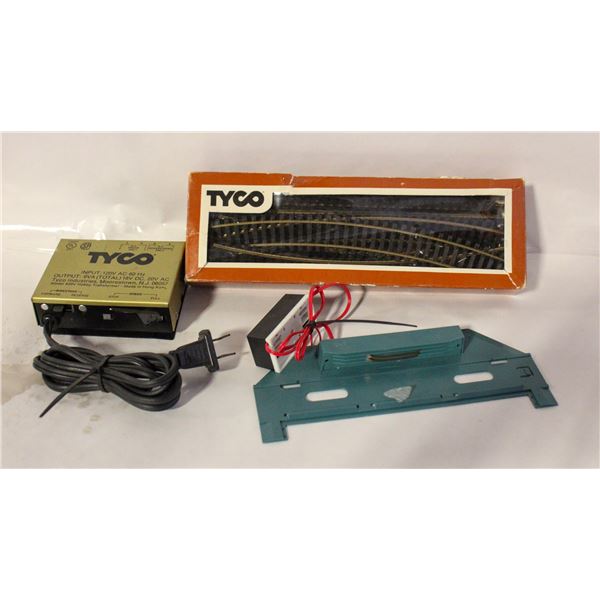 MODEL TRAIN SWITCH AND BOX OF TRACKS