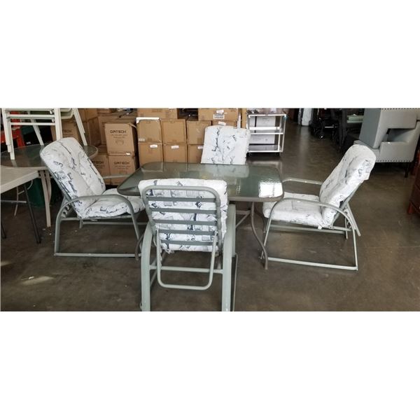 GLASS TOP PATIO TABLE W/ 4 CHAIRS THAT HAVE ADJUSTABLE BACKS