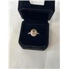 Image 1 : 925 STERLING SILVER W/ TOPAZ QUARTZ STONE W/ TINY STONES AROUND AND PART OF SHANK