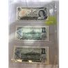 Image 2 : 3 MINT 1973 CANADIAN $1 BILLS 2 IN SEQUENCE