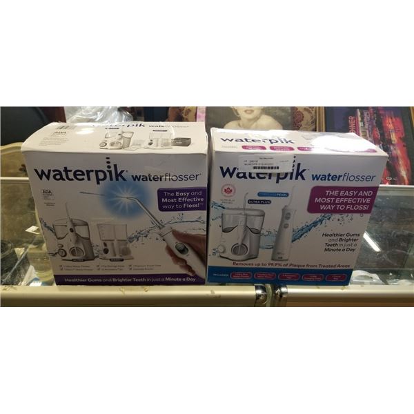 TWO WATERPIK SETS UNTESTED