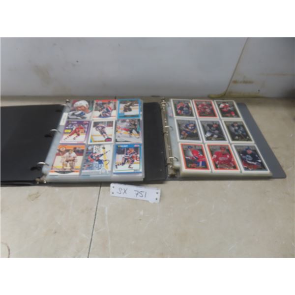 2 Binders filled with hockey cards