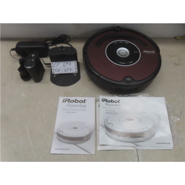 iRobot Roomba vacuum w/ charging dock and manual