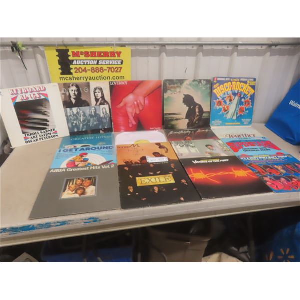 17 LP records including Foreigner, Loverboy, Cat Stevens, etc.