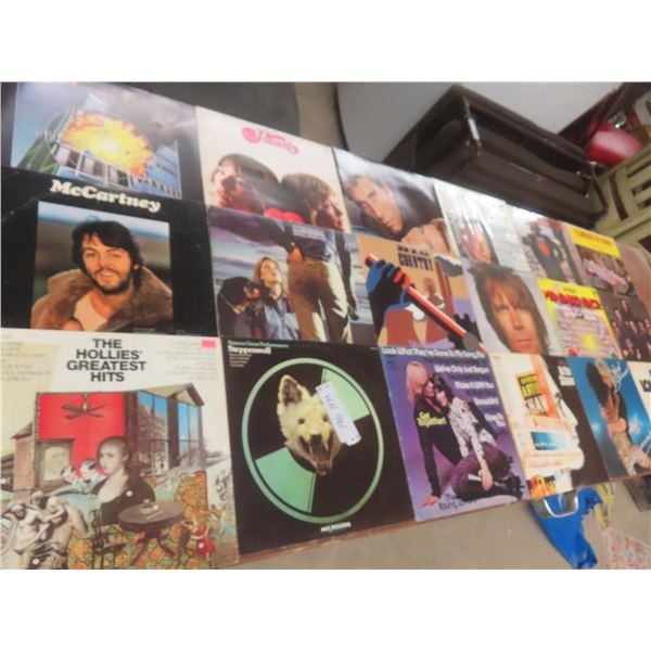 18 LP records including Def Leppard, Paul McCartney, Hollies, etc.