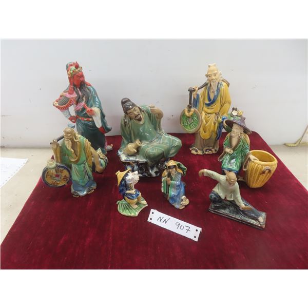 Lot of Eight China Figurines Including Mudman and Others, Some Damage, Pictured.
