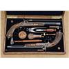 Image 1 : Cased pair of percussion target/dueling pistols circa approximately 1850, blued and fluted barrels, 