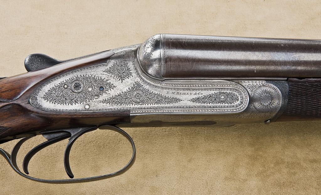 Classic full side lock doublebarrel 12ga shotgun with Damascus pattern