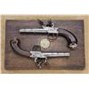 Image 2 : A pair of silver-mounted screw-barrel flintlock coat-sized pistols by T. Richards in later period or