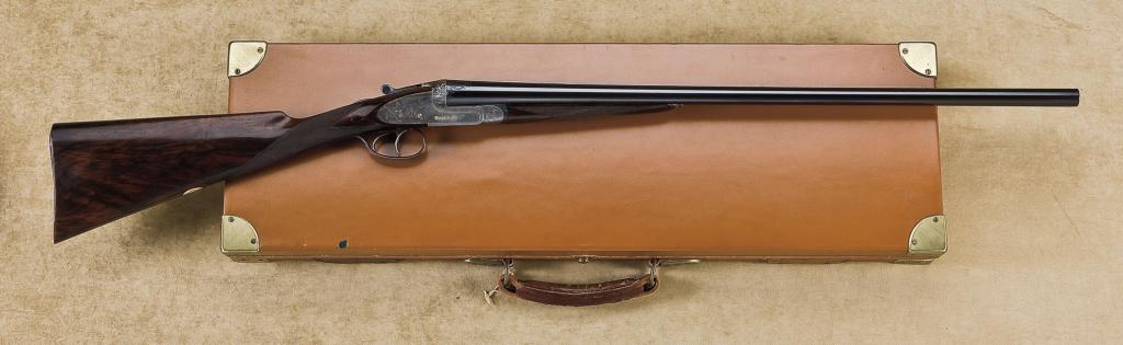 Ornately engraved and high relief chiseled Boss Side lock Shotgun with ...
