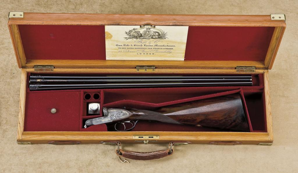 Ornately engraved and high relief chiseled Boss Side lock Shotgun with ...