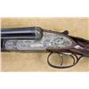 Image 5 : Ornately engraved and high relief chiseled Boss Side lock Shotgun with extra set of barrels and seco