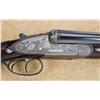 Image 6 : Ornately engraved and high relief chiseled Boss Side lock Shotgun with extra set of barrels and seco