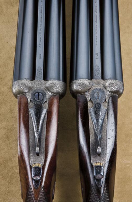 Pair of Purdey full side lock doublebarrel side by side shotguns, in