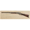 Image 1 : Winchester model 1873, .32-20 caliber, semi deluxe rifle, 24” octagon barrel, button mag, blue and c