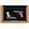 Image 1 : Colt Mark IV series pair of first and second edition .380 semiautomatic pistols with matching serial
