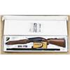 Image 1 : Beretta model A303, 12ga, semi-automatic shotgun. Like new in box, with screw in chokes. 99% plus to