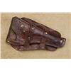 Image 1 : Double loop tooled leather holster fitting a Colt SAA revolver with 5-1/2” barrel, in overall good c