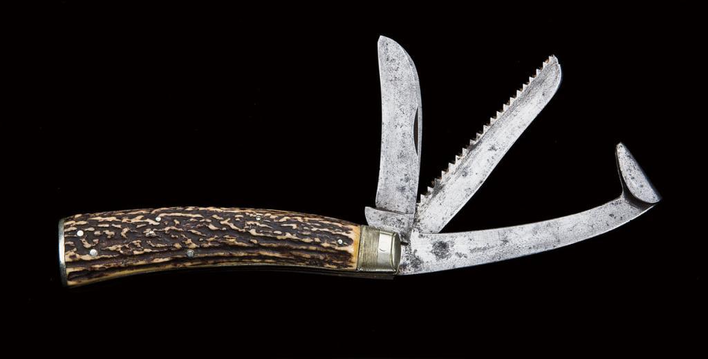 Large and unusual threebladed knife in a pruning pattern, marked