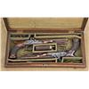 Image 1 : Pair of English saw-handle dueling pistols by H. Nock of London, cased with accessories. The pair ha