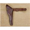 Image 1 : Brown tooled leather flap holster and cartridge belt for a Colt SAA revolver in overall good conditi