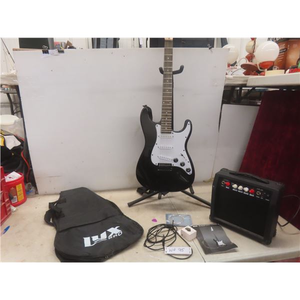 Lynx Pro Electric Guitar with Strap, Stand, Case, and Amp