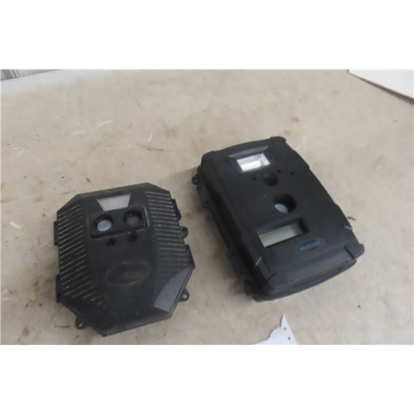 Two Game Cameras: Wildgame And Moultrie