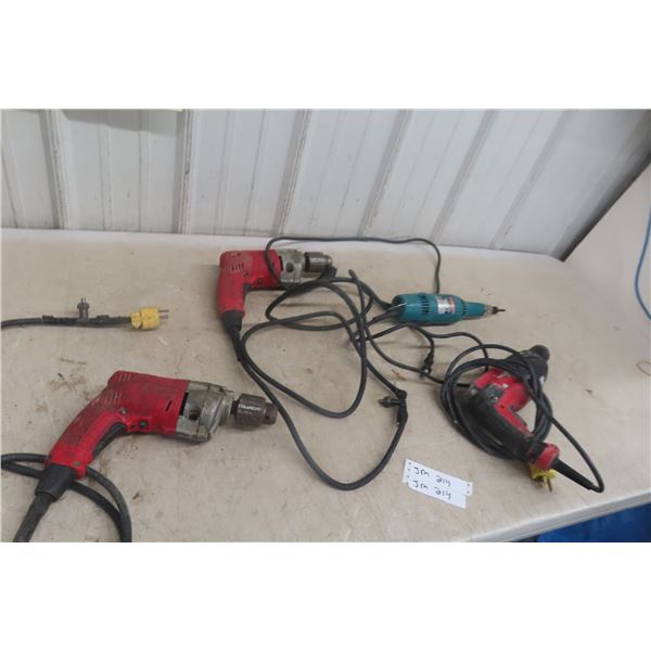 4 Power Tools: Milwaukee Hammer Drill and 1/2" Drills (x2); Makita Disc Grinder
