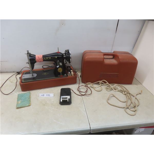 Raico Electric Sewing Machine With Manual; Clamp On Case Broken.