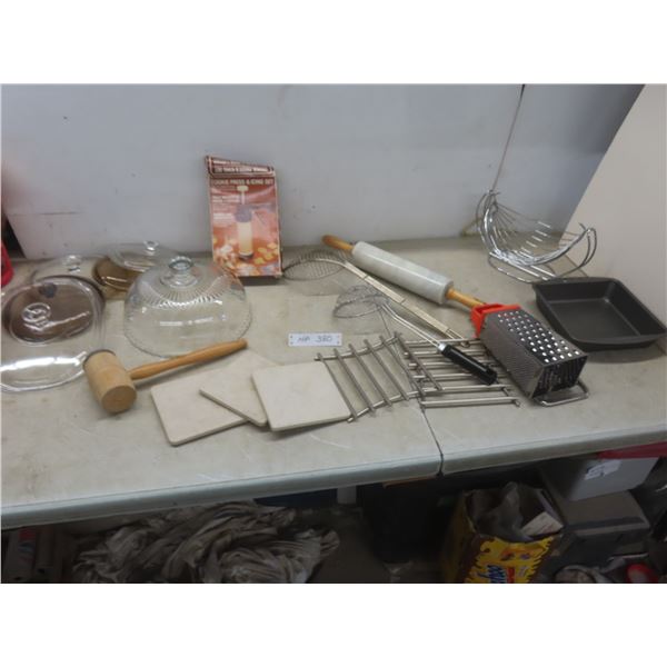 Kitchenware Lot — Cookie Press, Glass Cake Lid, Trivets, Marble Rolling Pin, Grater and More.