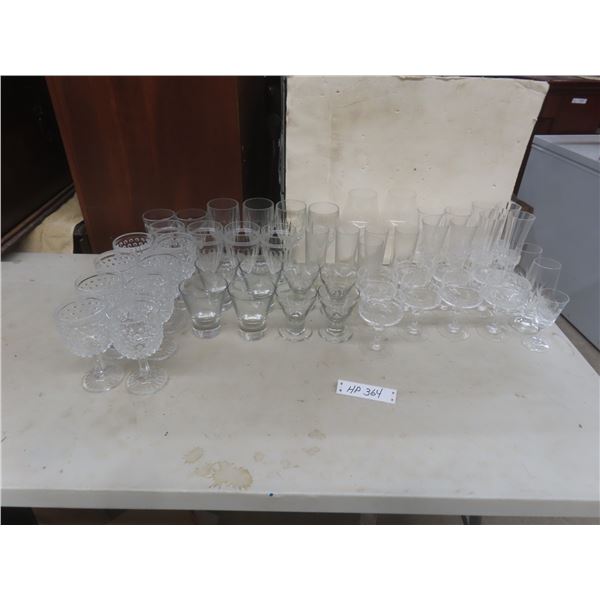 Glassware — Champagne Flutes, Wine Goblets, And Margarita Glasses.