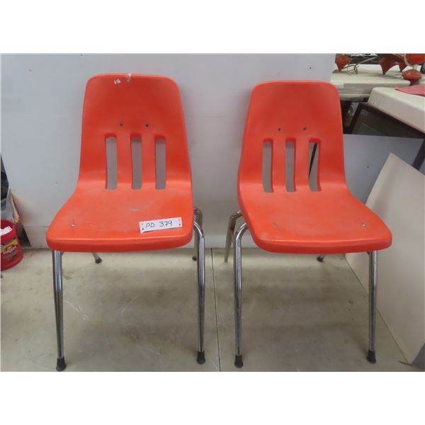 2 Stackable Orange Chairs.