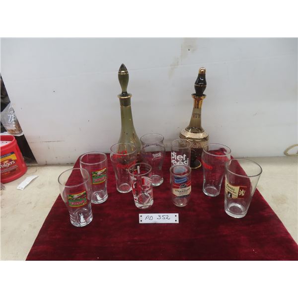 2 Glass Decanters; Assorted Branded Glasses — Coca-Cola, Pepsi, Coors, Pilsner, Samuel Adams.