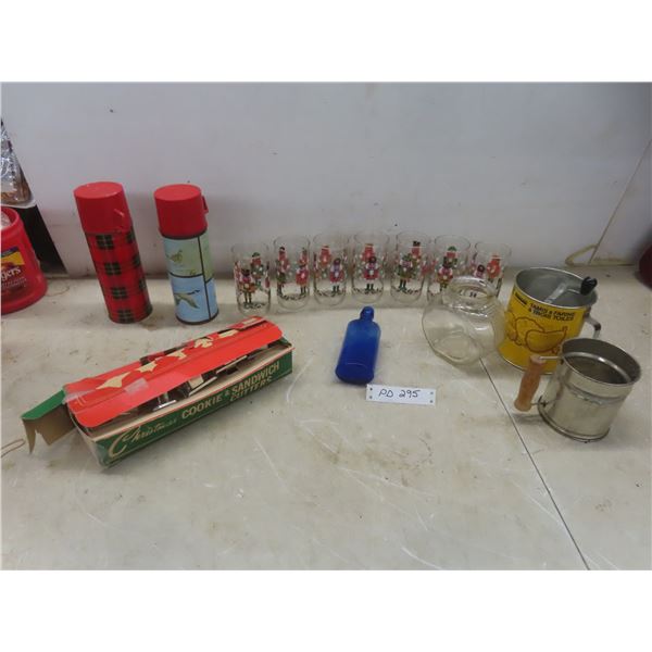 2 Vintage Thermos With Glass Inserts; 5 Metal Cookie Cutters; 2 Sifters; And 7 Tin Soldier Glasses.