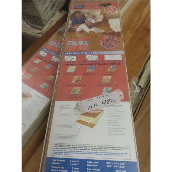 2 Boxes Of Lux Click Flooring With Extra Pieces.