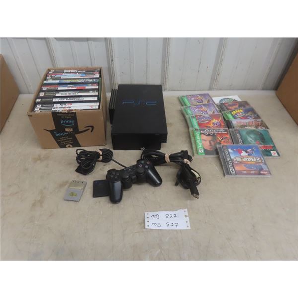 PlayStation 2 Console With Controller, 2 Memory Cards, And Assorted Games.