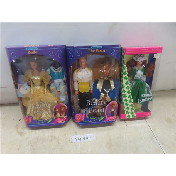 3 Collectible Barbies.