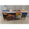 Image 6 : New Bright RC Cat Dump Truck in Box 
