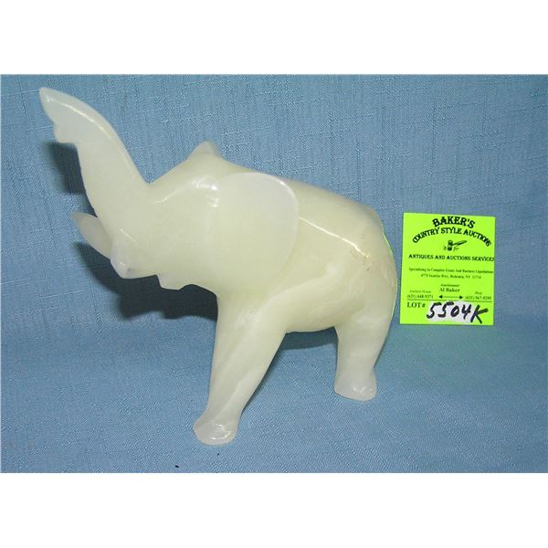 Alabaster elephant with upraised trunk