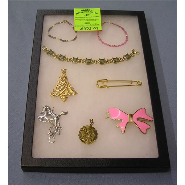 Group of quality pins and bracelets