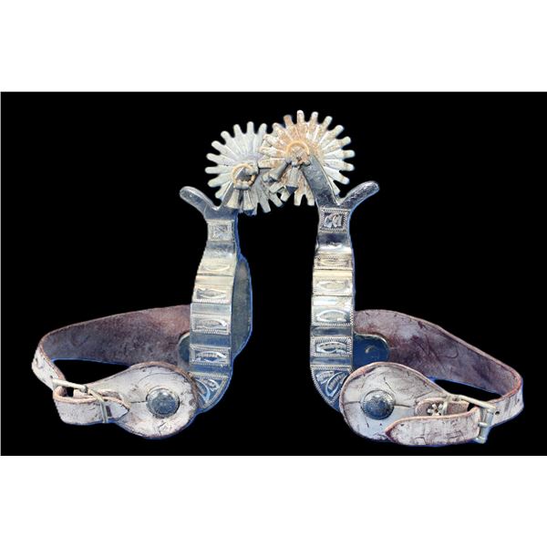 Unmarked Overlaid Spurs- 1" Bands- 2.25" Shanks- 2.1" 20 Point Rowels- Chap Guards- Jingle Bobs- Str