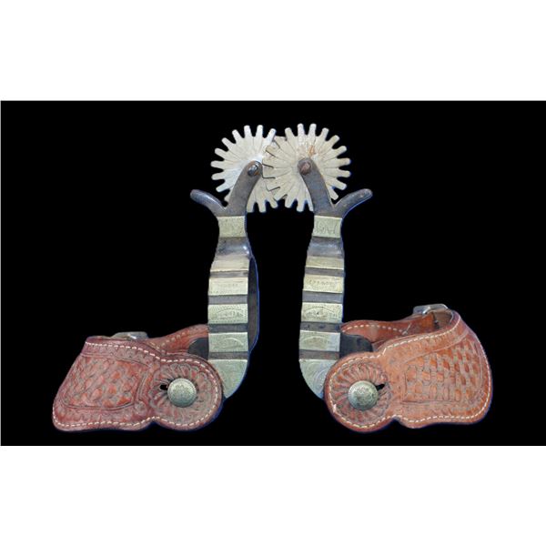 Unmarked Overlaid Spurs- 1" Bands- 2.3" Shanks- 2.1" 20 Point Rowels- Chap Guards- Stamped Straps- F