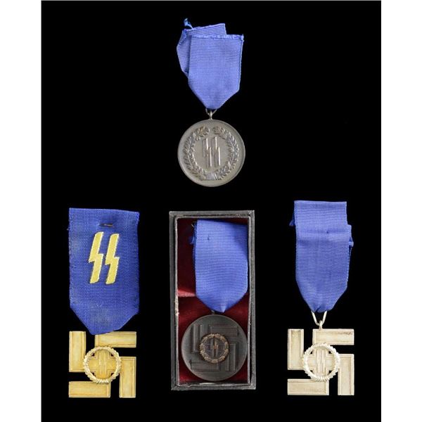 4 WWII STYLE GERMAN SS LONG SERVICE MEDALS.