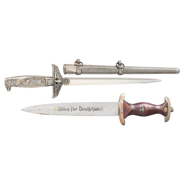 2 WWII STYLE GERMAN DAGGERS.