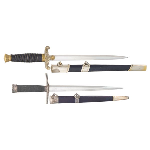 2 REPRODUCTION WWII GERMAN DAGGERS.