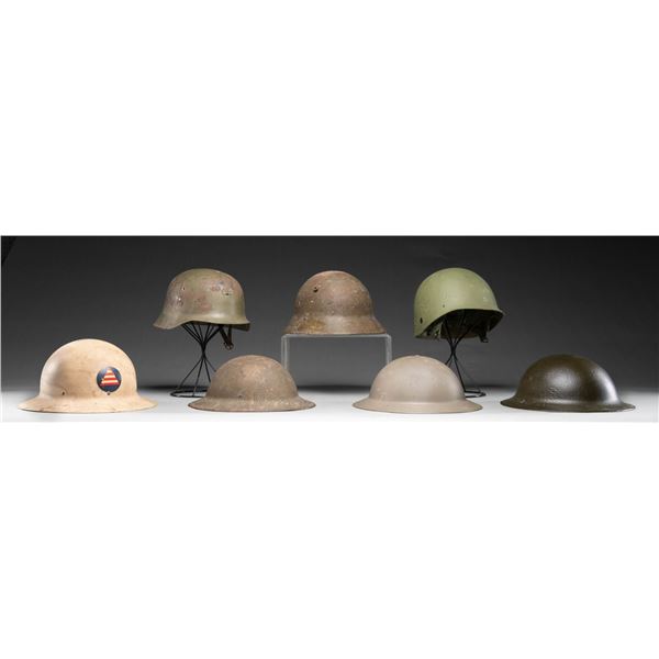 6 HELMETS AND A HELMET LINER.