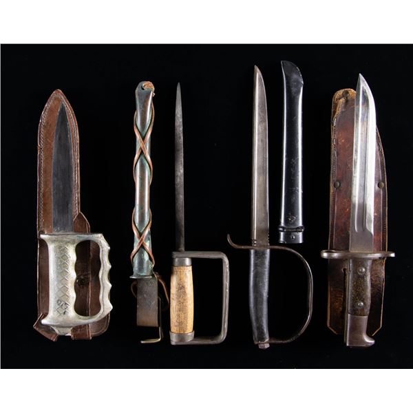 INTERESTING GROUPING OF FOUR FIGHTING KNIVES.