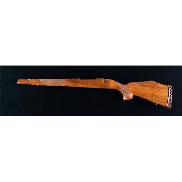 LEFT HAND WEATHERBY MARK V WALNUT STOCK.