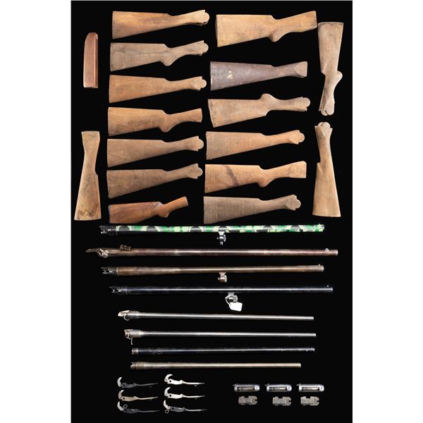 GROUPING OF GUN STOCKS, PARTS AND BARRELS.